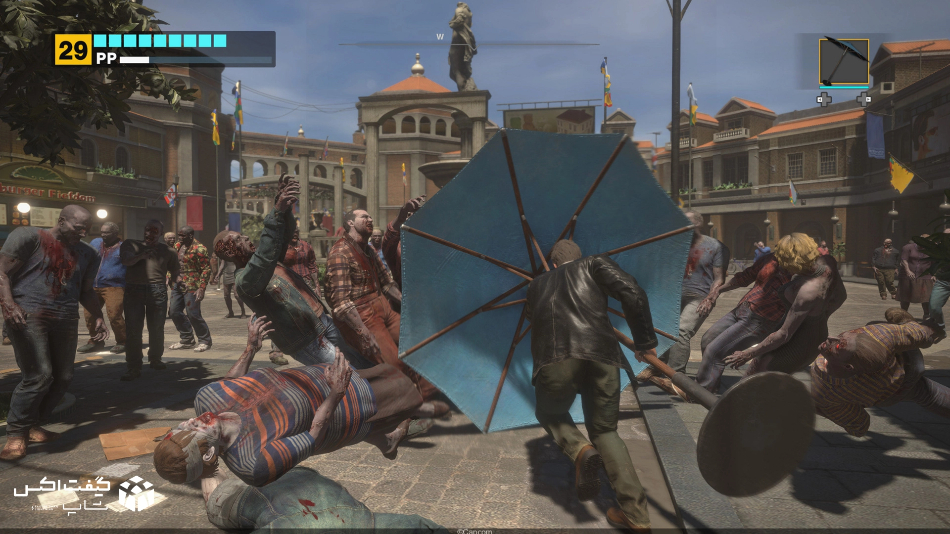 مبارزه شخصیت فرانک وست با زامبی‌ها با استفاده از چتر بزرگ در فضای باز، صحنه گیم‌پلی بازی Dead Rising Deluxe Remaster برای Xbox