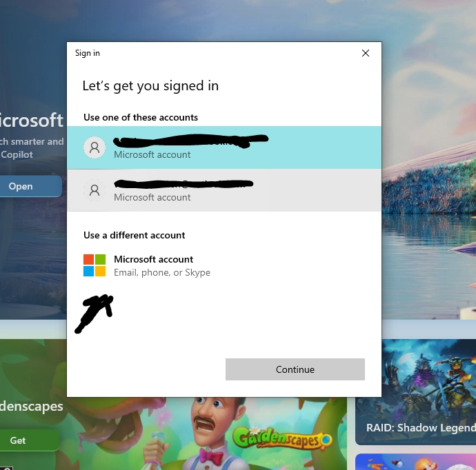 اسکرینشات از پنجره "Let's get you signed in" که دکمه "Use a different account" یا "Microsoft account" در آن مشخص شده است